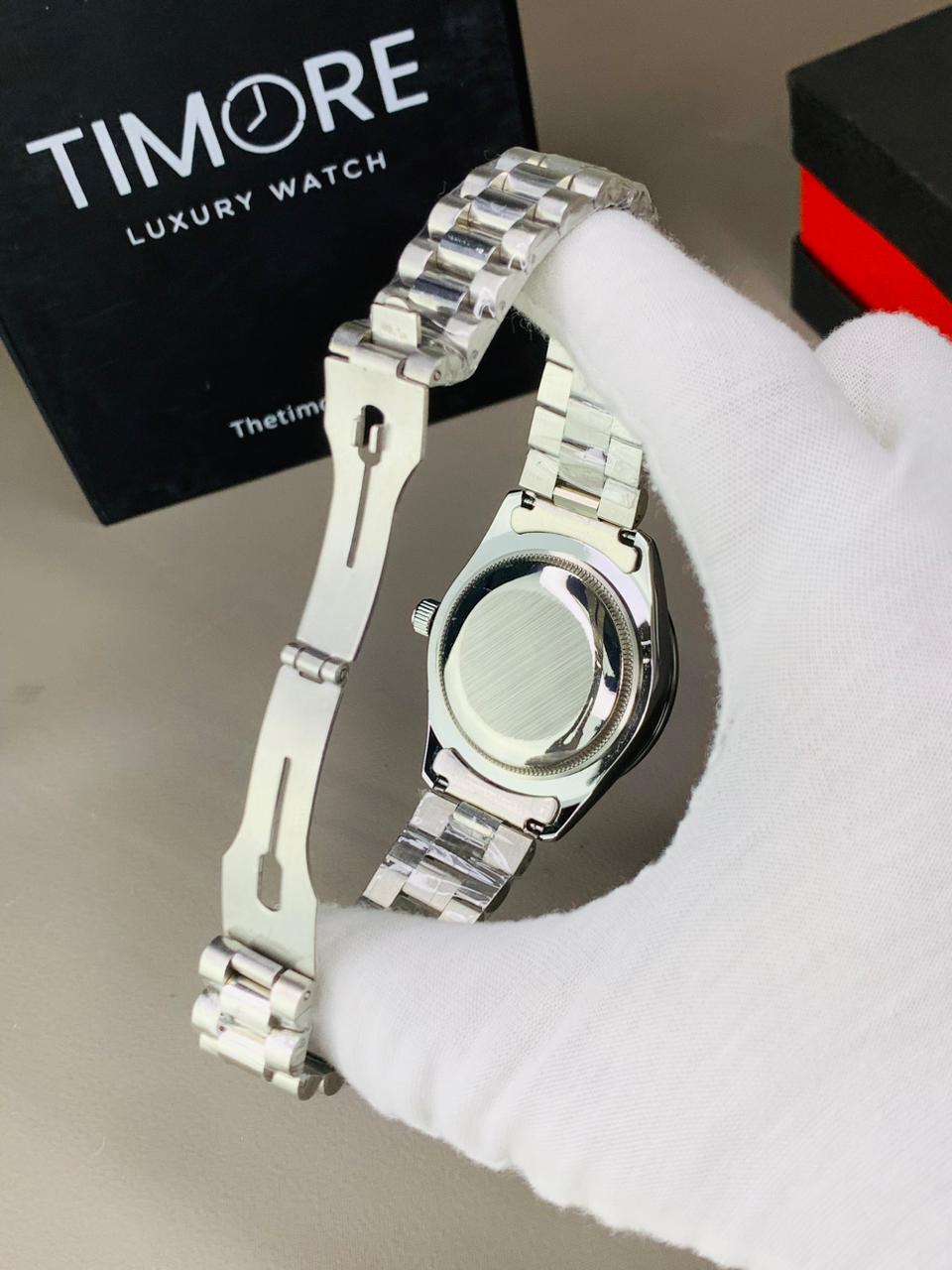 Rolex Silver Chain Blue Dial