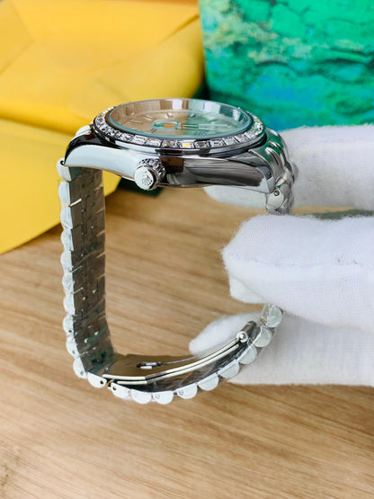 Rolex Oyster Perpetual Silver Sunray Dial 41